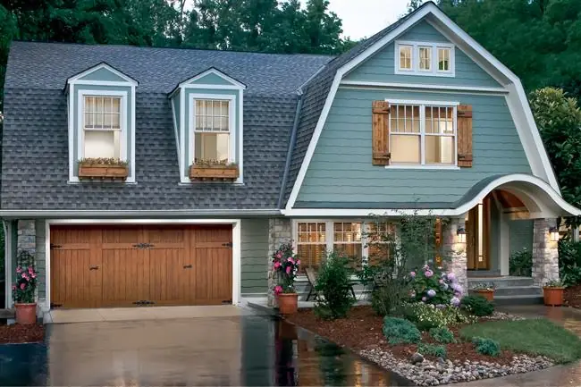 Carriage house faux wood garage door by Clopay