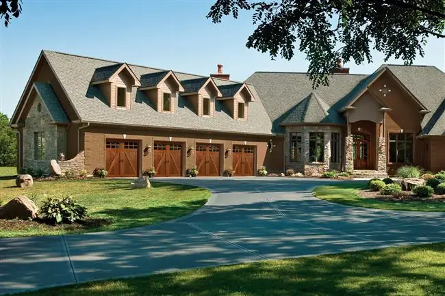 Canyon Ridge - Steel Insulated with Composite & Wood Overlays garage door by Clopay