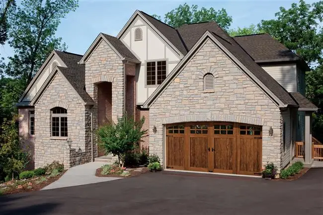 Canyon Ridge - Steel Insulated with Composite & Wood Overlays garage door by Clopay