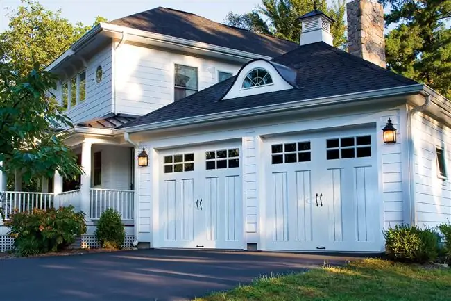 Canyon Ridge - Steel Insulated with Composite & Wood Overlays garage door by Clopay