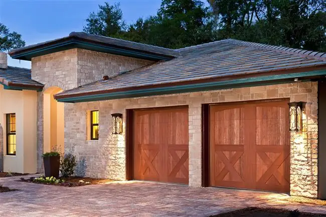 Canyon Ridge - Steel Insulated with Composite & Wood Overlays garage door by Clopay