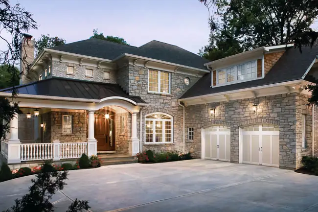 Carriage house painted garage door by Clopay