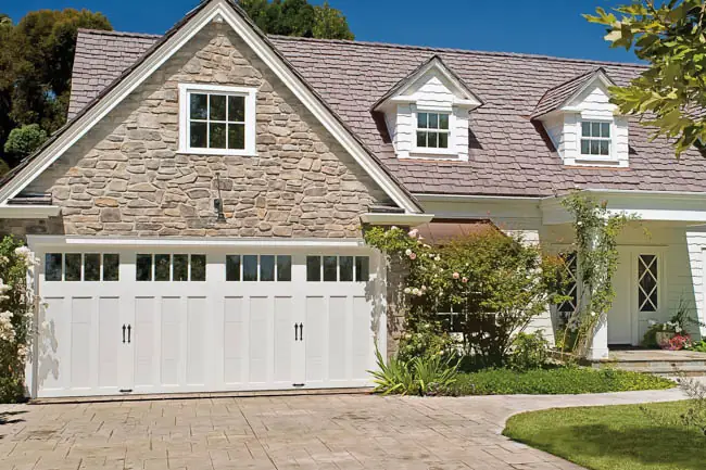 Coachman Collection - Steel Insulated with Composite Overlay garage door by Clopay