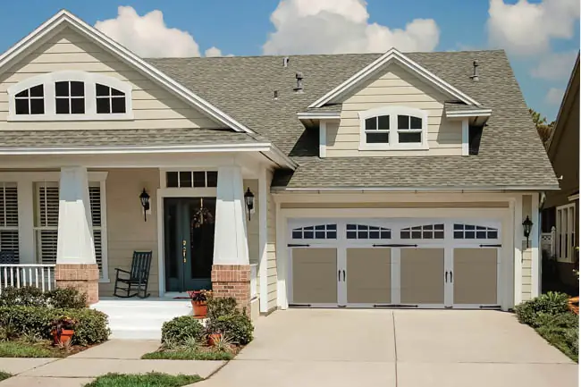 Coachman Collection - Steel Insulated with Composite Overlay garage door by Clopay