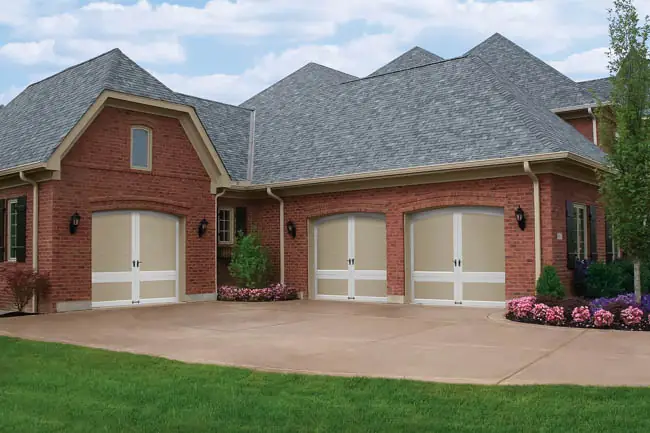 Coachman Collection - Steel Insulated with Composite Overlay garage door by Clopay