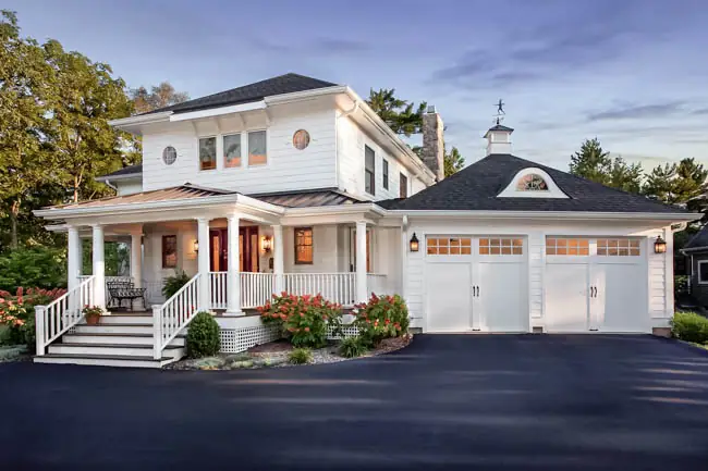 Coachman Collection - Steel Insulated with Composite Overlay garage door by Clopay