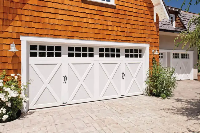Coachman Collection - Steel Insulated with Composite Overlay garage door by Clopay