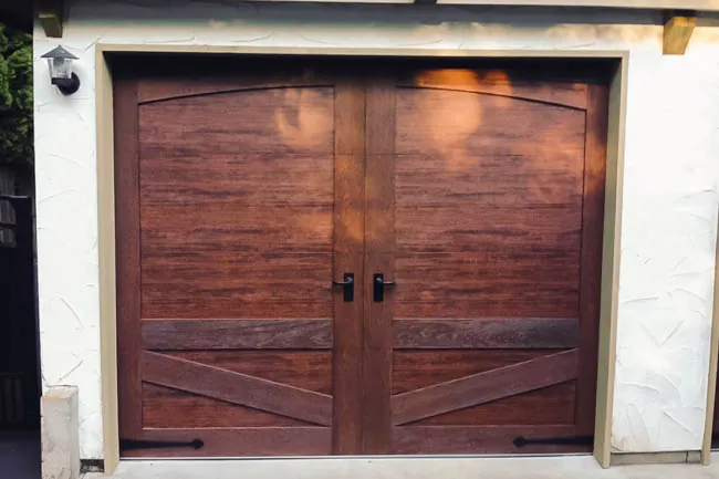 Bernie’s replacement Canyon Ridge carriage doors in a dark walnut finish